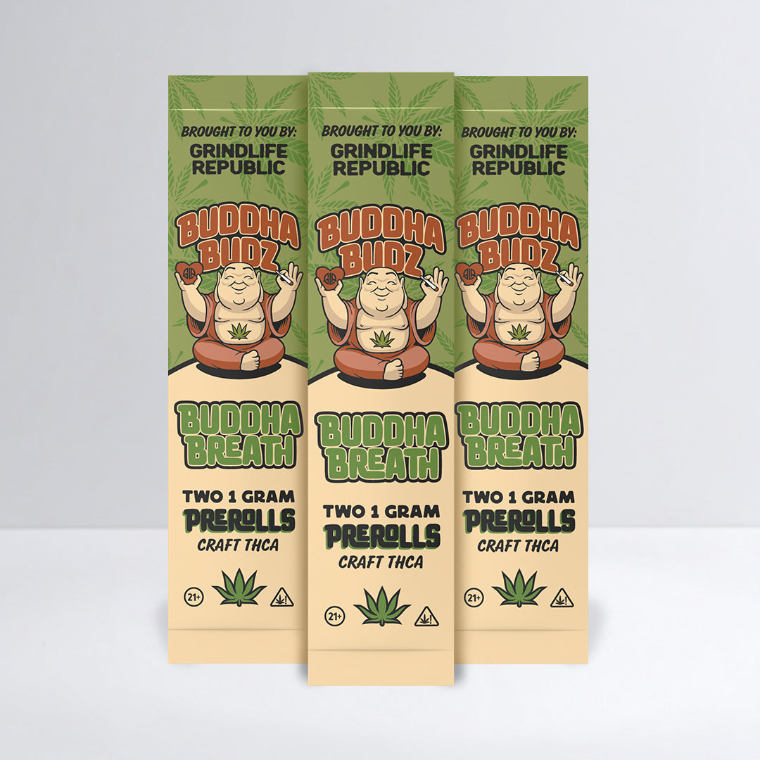 Three packages of Buddha Budz Buddha Breath with cartoon character on a light gray background