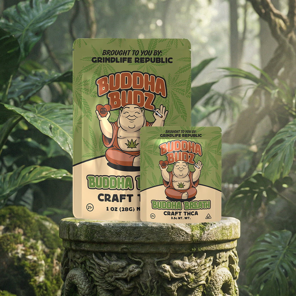 Two packages of Buddha Budz Craft THC on a stone pedestal with a forest background