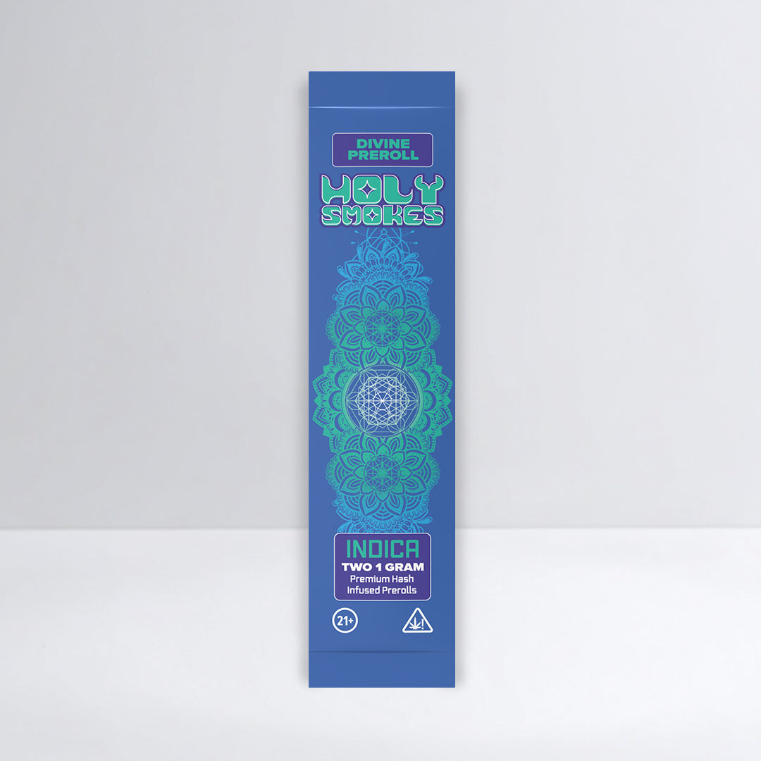 Blue packaging of Holy Smokes Divine Preroll with intricate design on a white background