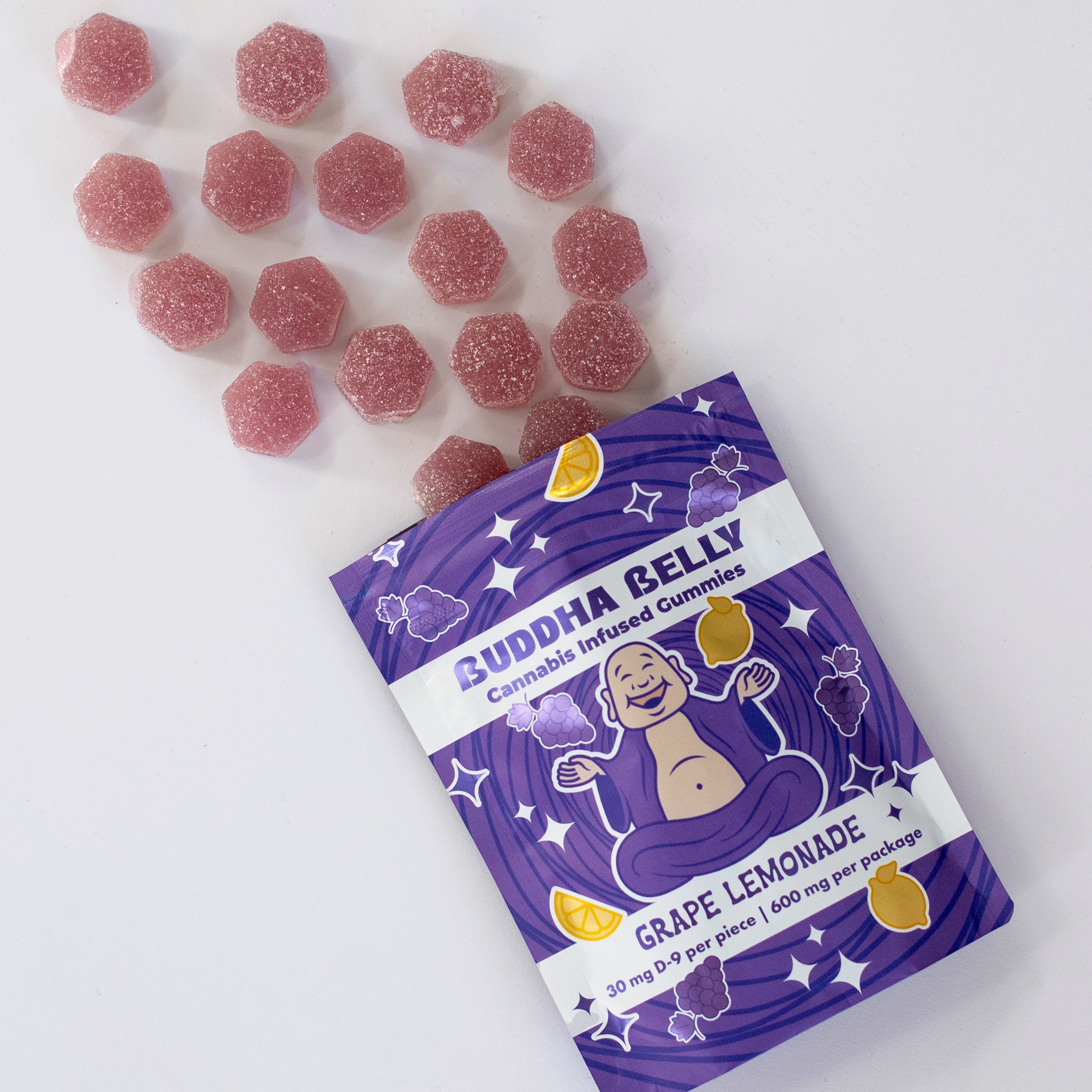 Buddha Belly cannabis-infused gummies packaging with gummies on a white background