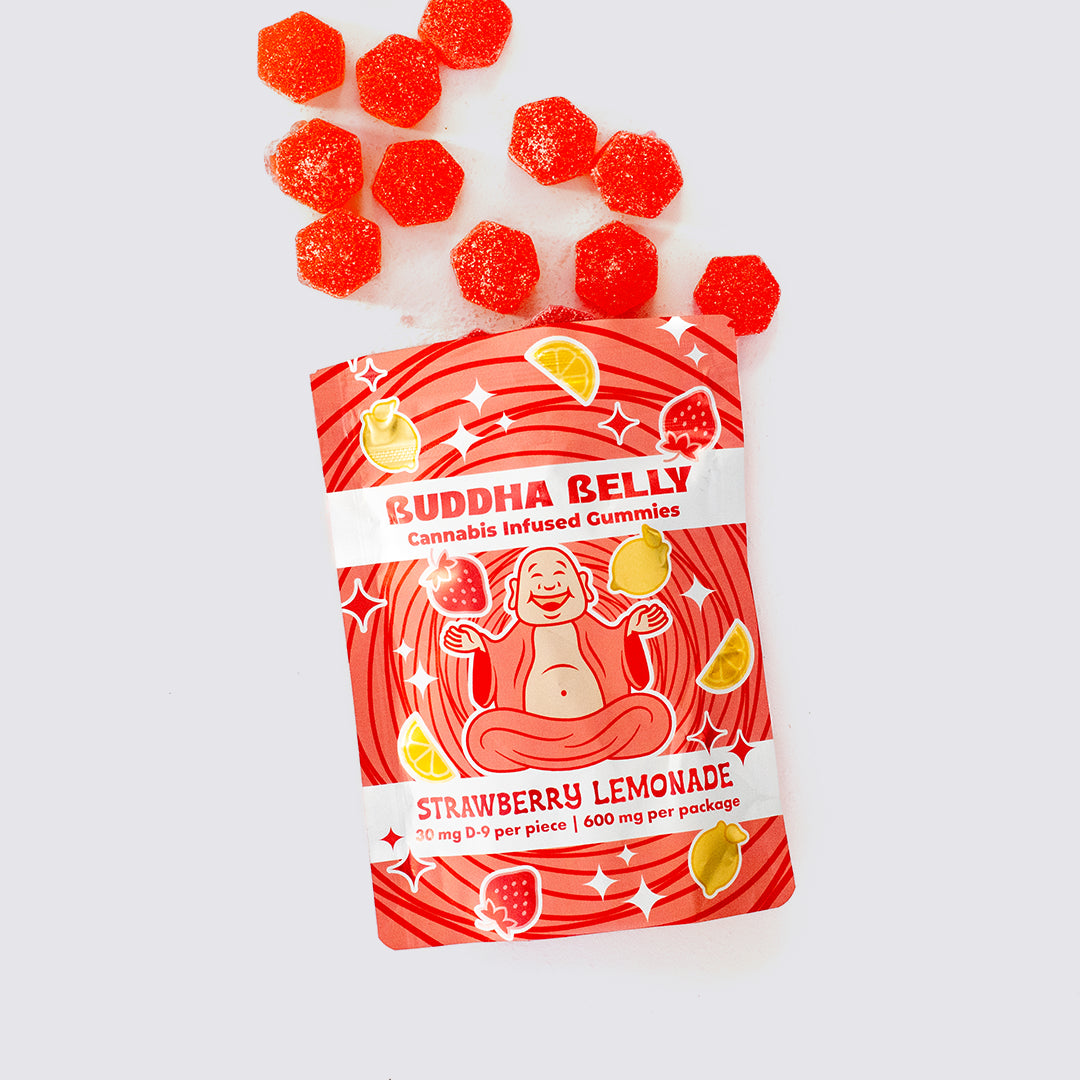 Red packaging of Buddha Belly strawberry lemonade cannabis-infused gummies on a white background